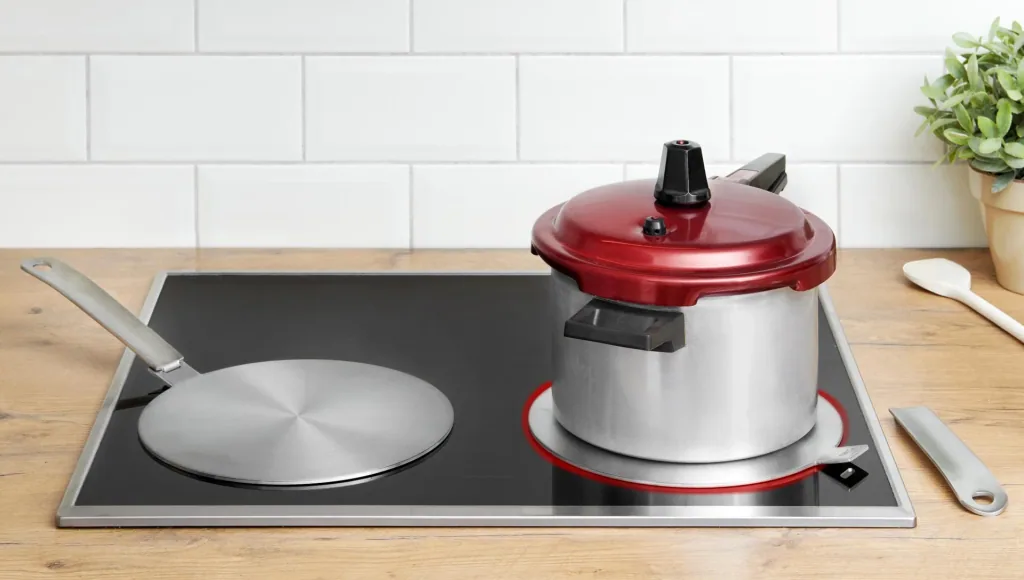 Induktion Adapterplatte Ø 24 cm Edelstahl mit abnehmbarem Griff