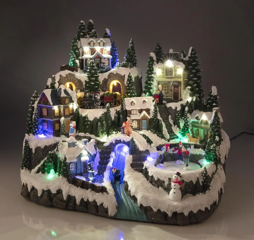 Weihnachtliche Dorfszene mit Beleuchtung und Musik