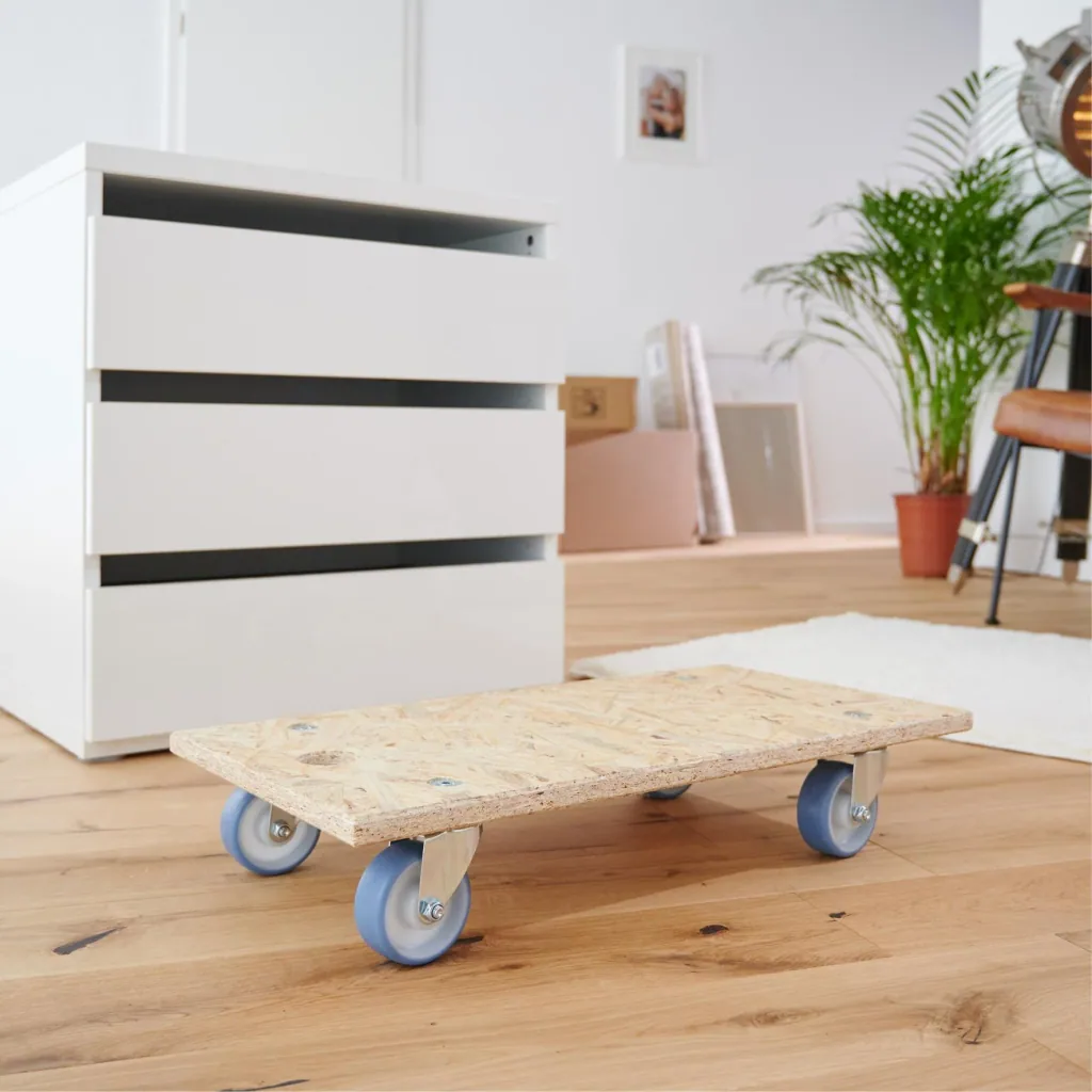 Transporthilfe MM 1173 , 57,5 x 30 x 11 mm, softe Rollen Ø 75 mm, Rollenlager, OSB Platte, CO2-neutral, Tragkraft 250 kg