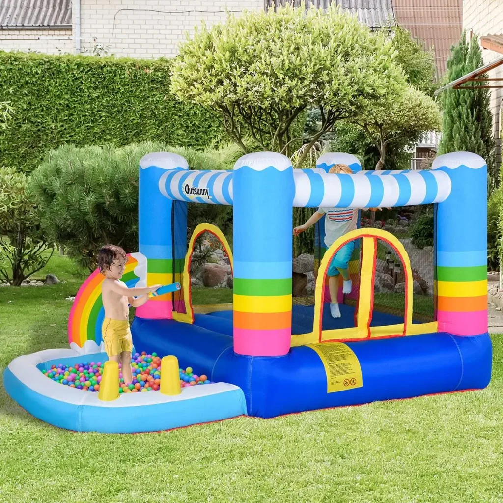 Kinderhüpfburg im Regenbogen-Design bunt