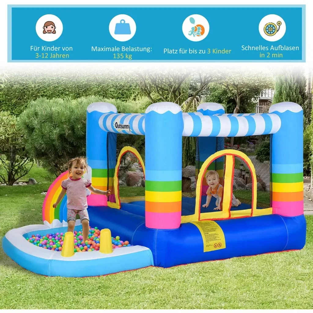 Kinderhüpfburg im Regenbogen-Design bunt