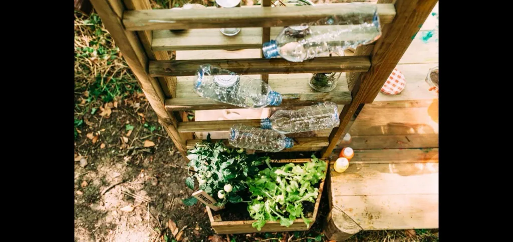 Discovery Küche   Outdoor-Spielküche für Kinder aus Holz, Pflanzkübel, Malscheibe, Windspiel, natur