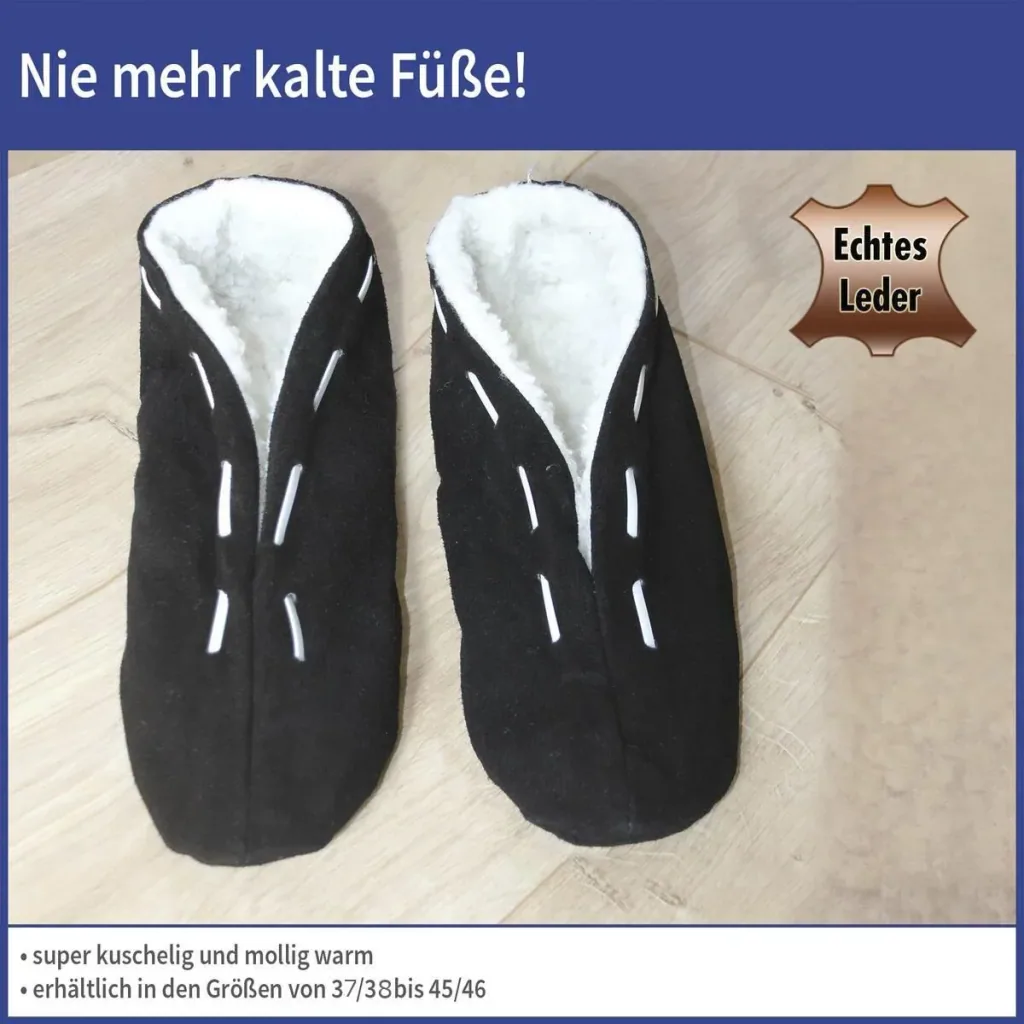 Fellhausschuhe, schwarz, Größe 43/44