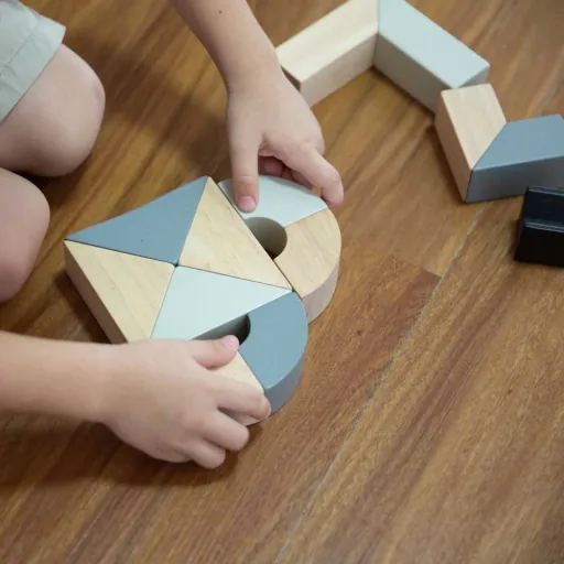 Plan Toys drehbare Holzklötze grau schwarz Holz