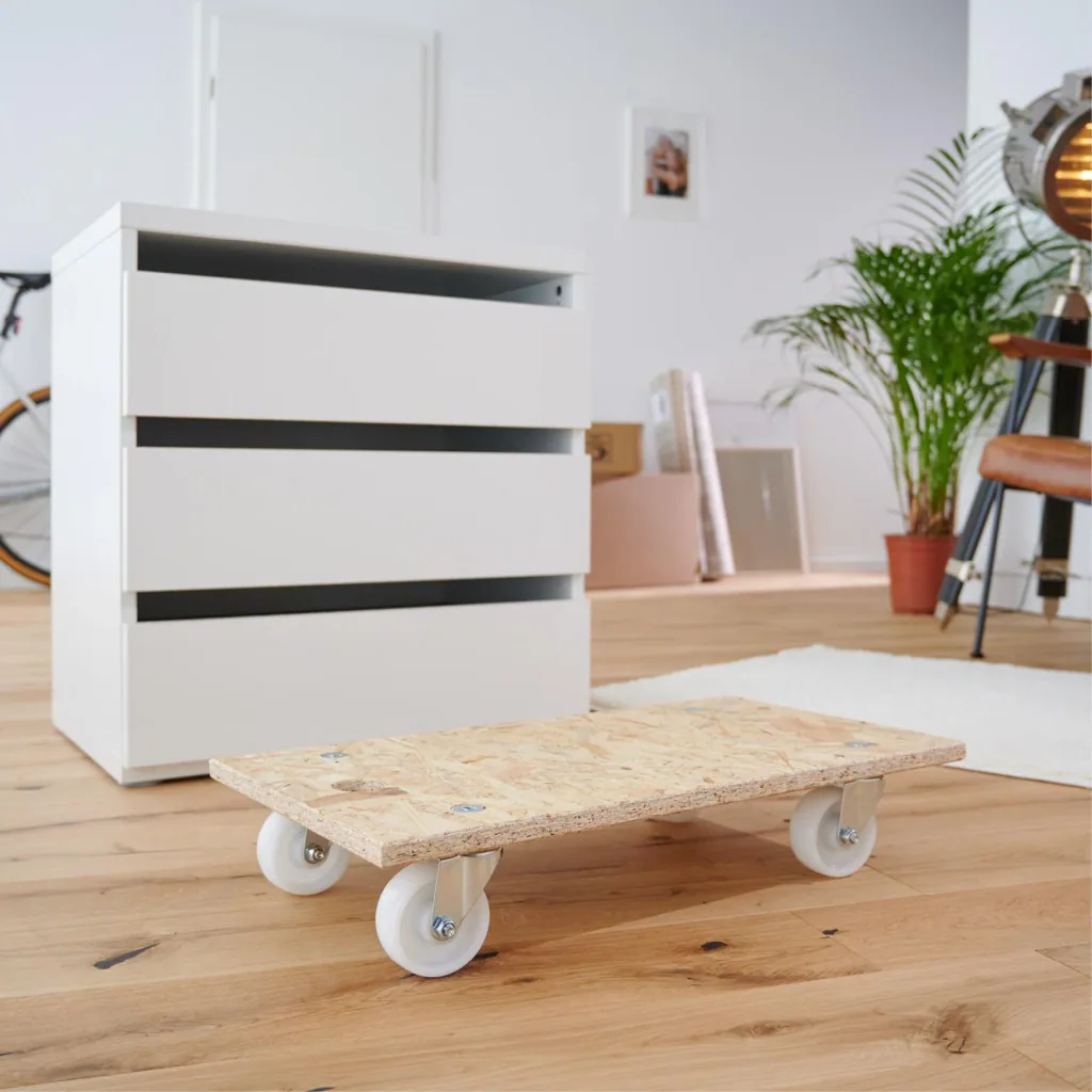 Transporthilfe MM 1141, 57,5 x 30 x 11 cm, harte Rollen Ø 75 mm, Rollenlager, OSB Platte, CO2-neutral, Tragkraft 250 kg